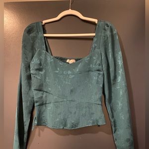 Green longe sleeve top with flora design